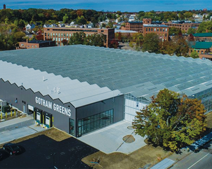 Gotham Greens opens 100,000 s/f greenhouse along the Woonasquatucket River